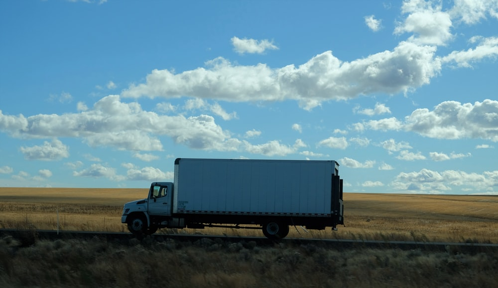 a white truck on the road